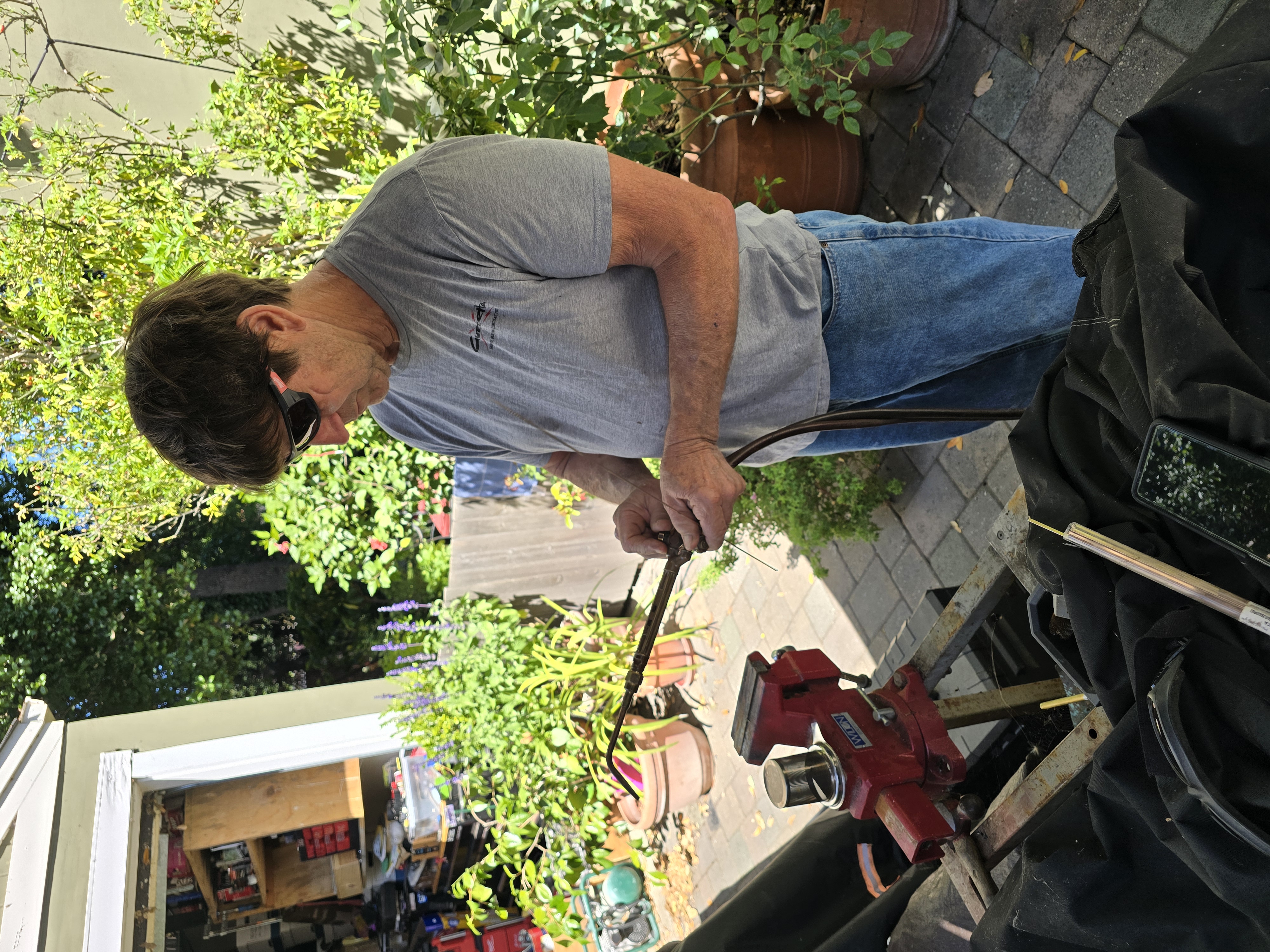 Steve Guzzetta working in a log yard